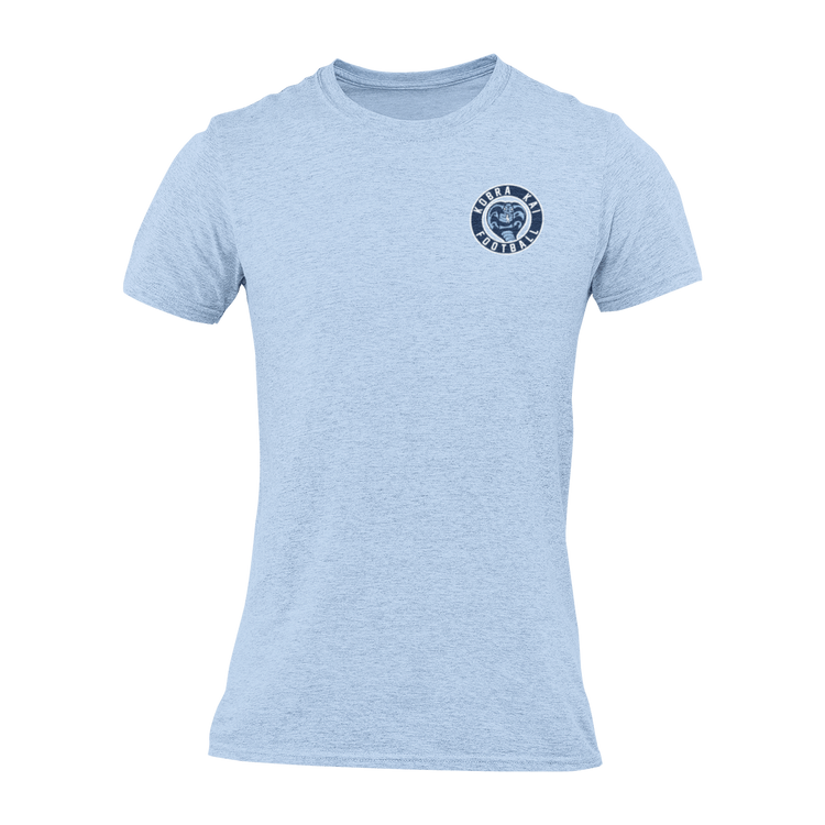 A light blue short-sleeve crewneck t-shirt with a circular navy blue Kobra Kai Football logo displayed on the upper chest.