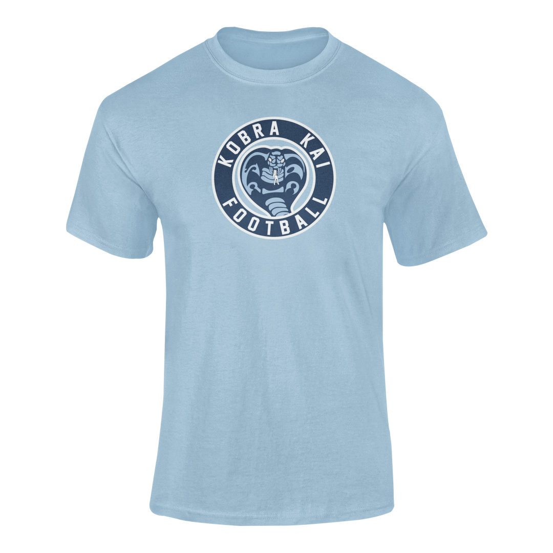 A light blue short-sleeve performance t-shirt featuring a graphic print on the chest that reads 'Kobra Kai Football'.